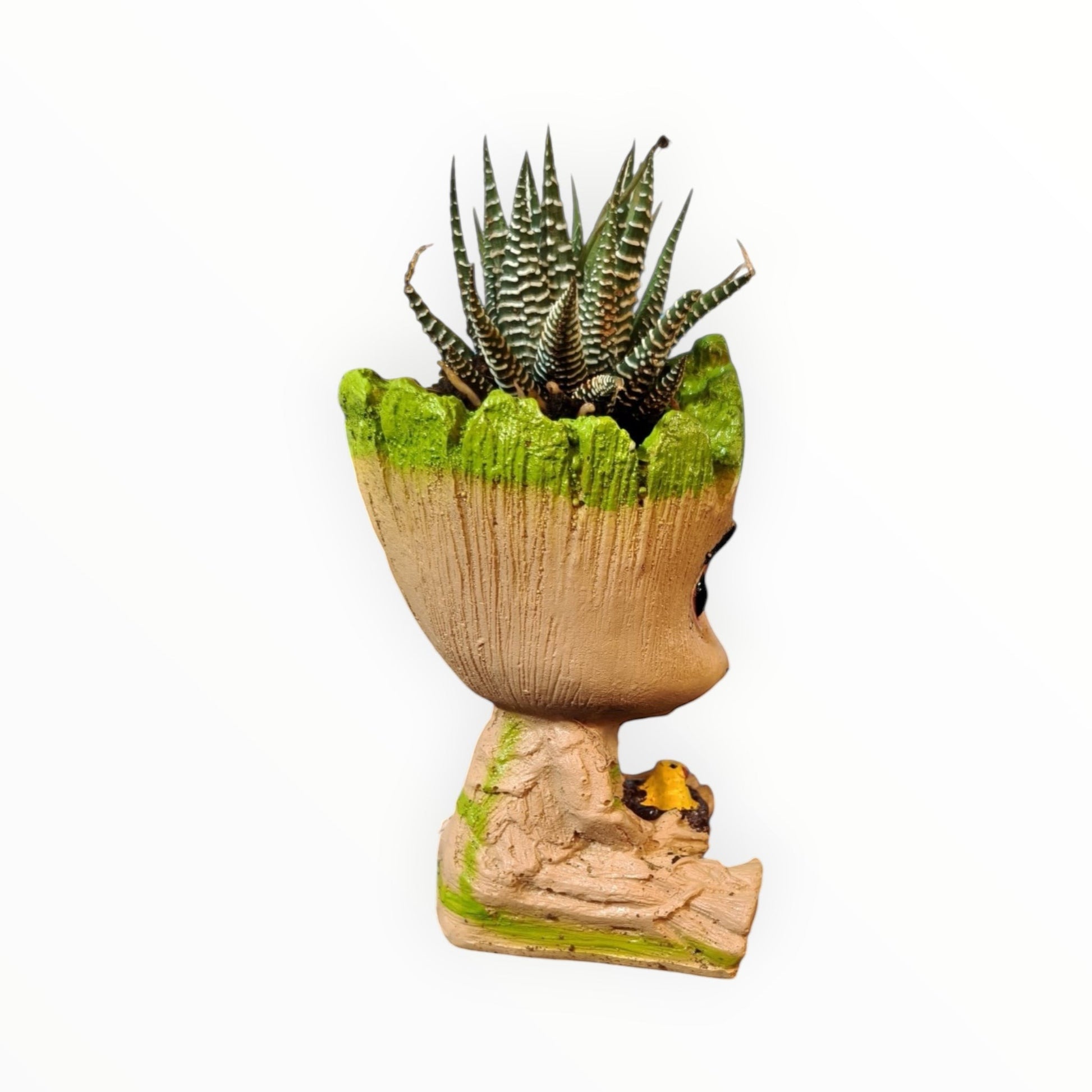 MyPlantMyTaste Baby Groot planter with a Zebra Haworthia succulent. Tan resin planter with green accents.